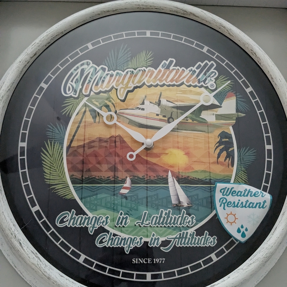 Margaritaville White and Navy Wrather Resistant Wall Clock: Changes In Latitude